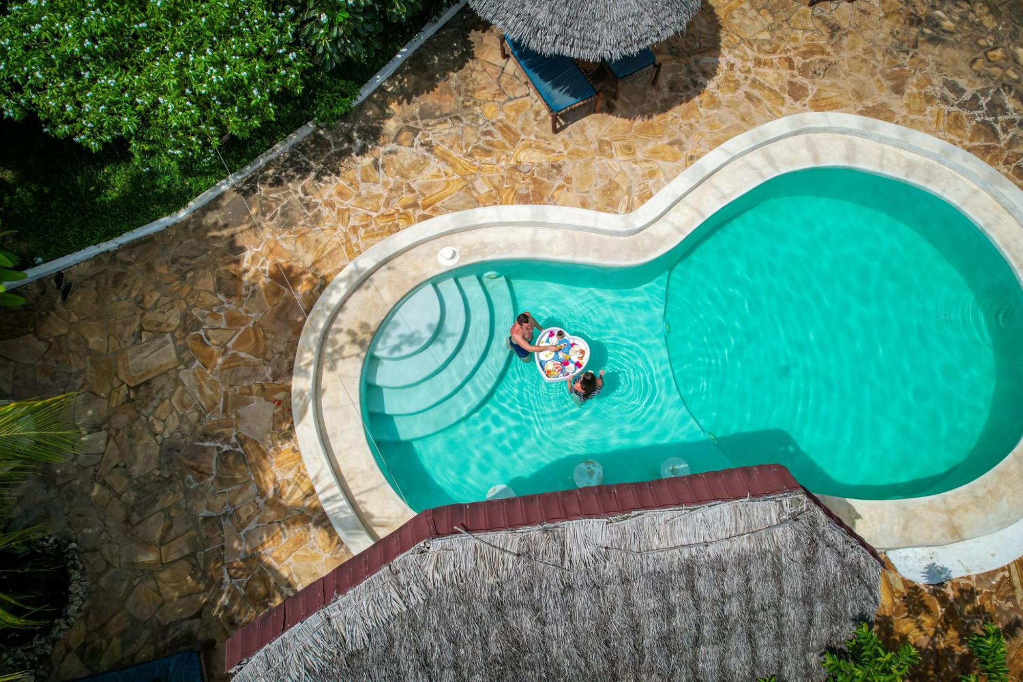 Mawimbi Bungalows Nungwi Bagian luar foto